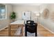 Home office area with modern decor, hardwood floors and art at 41 Garner Ln, Erie, CO 80516