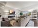 Spacious living room with a fireplace and plenty of natural light at 23671 E Mineral Pl, Aurora, CO 80016