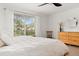 Bedroom with neutral carpet, a ceiling fan and a window with view at 11705 W Stanford Ln, Morrison, CO 80465