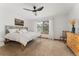 Bedroom with neutral carpet, a ceiling fan and a window with view at 11705 W Stanford Ln, Morrison, CO 80465