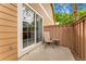 Outdoor patio space featuring a sliding glass door and patio furniture at 11705 W Stanford Ln, Morrison, CO 80465
