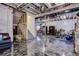 Unfinished basement with epoxy floors and exposed piping offers customization options at 8760 Ginkgo Loop, Parker, CO 80134