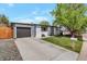 Charming single-story home with well-manicured lawn, long driveway and a one car garage at 251 Norse St, Golden, CO 80401