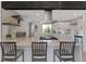 Modern kitchen with stainless steel appliances, white cabinets, and a center island at 251 Norse St, Golden, CO 80401