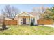 Charming single-story home featuring a welcoming front porch and well-maintained lawn at 851 Quitman St, Denver, CO 80204