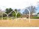 Fun swing set installation in a well-maintained park, providing a safe and enjoyable play area at 851 Quitman St, Denver, CO 80204