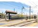 RTD Perry Station with pedestrian overpass, train tracks, and commuter access at 851 Quitman St, Denver, CO 80204
