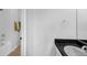 Clean bathroom featuring tub/shower combo and modern sink at 887 Sundance Ln, Erie, CO 80516