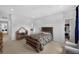 Bright bedroom offers a bed, cute play area, and neutral paint at 887 Sundance Ln, Erie, CO 80516