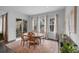 Cozy dining area featuring a wooden table, chairs and ample natural light at 887 Sundance Ln, Erie, CO 80516