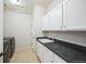 Laundry room with countertop, sink, washer, and dryer at 887 Sundance Ln, Erie, CO 80516