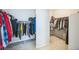 Organized walk-in closet featuring ample hanging space and shelving for efficient storage of clothing and accessories at 887 Sundance Ln, Erie, CO 80516