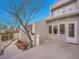 Exterior shot of home's backyard area with deck and well-maintained landscaping at 9200 E Cherry Creek South Dr # 29, Denver, CO 80231