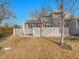 Back exterior of home, fenced backyard with grass at 9200 E Cherry Creek South Dr # 29, Denver, CO 80231