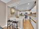 Well-lit kitchen features stainless steel appliances, recessed lighting, and hardwood floors at 9200 E Cherry Creek South Dr # 29, Denver, CO 80231