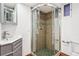 Bathroom featuring a glass shower and a grey vanity at 1451 N Gilpin St, Denver, CO 80218