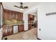 Well-equipped kitchen features stainless steel appliances, tile flooring, and wooden cabinets at 1451 N Gilpin St, Denver, CO 80218