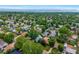 Wide aerial view showing neighborhood houses and tree coverage at 2535 S Julian St, Denver, CO 80219