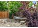 Tranquil backyard retreat featuring a hammock and lush landscaping, perfect for relaxation at 2535 S Julian St, Denver, CO 80219