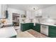 Bright kitchen featuring two-tone cabinetry, stainless steel appliances, and modern fixtures at 2535 S Julian St, Denver, CO 80219