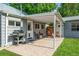 Cozy backyard patio with grill and seating, perfect for outdoor dining and entertainment at 2535 S Julian St, Denver, CO 80219