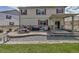 Outdoor living is easy in this backyard with custom patio and BBQ area at 5789 Echo Park Cir, Castle Rock, CO 80104