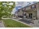 Enjoy the outdoors in this backyard with covered patio and mature landscaping at 5789 Echo Park Cir, Castle Rock, CO 80104