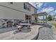 Enjoy outdoor dining on this home's stamped concrete patio with covered area at 5789 Echo Park Cir, Castle Rock, CO 80104