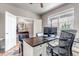 Bright office space with modern desk, comfortable chairs, and sun-filled window at 5789 Echo Park Cir, Castle Rock, CO 80104