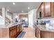 A spacious kitchen featuring granite countertops, stainless steel appliances and wooden floors at 5789 Echo Park Cir, Castle Rock, CO 80104