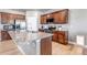 Spacious kitchen with granite countertops, stainless steel appliances, and hardwood floors at 5789 Echo Park Cir, Castle Rock, CO 80104