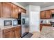 Beautiful kitchen with stainless steel appliances, granite countertops, and ample cabinet space at 5789 Echo Park Cir, Castle Rock, CO 80104