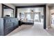 Spacious main bedroom with dark wood trim, neutral walls, and bright natural light at 5789 Echo Park Cir, Castle Rock, CO 80104