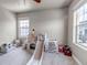 Playroom area with large windows and kid-friendly furniture at 5789 Echo Park Cir, Castle Rock, CO 80104
