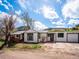 Exterior view of a charming home, showcasing its well-maintained facade and outdoor charm at 2733 S Riverview Dr, Idledale, CO 80453