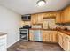 Kitchen featuring stainless steel appliances, wooden countertops and a gas range at 2733 S Riverview Dr, Idledale, CO 80453