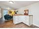 Cozy living space with adjacent kitchen area, perfect for entertaining guests at 2733 S Riverview Dr, Idledale, CO 80453