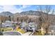 Aerial view of a home nestled in a neighborhood with mountain views at 245 Fair Pl, Boulder, CO 80302