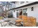 Relaxing outdoor space with wicker chairs and a small table on a wooden deck at 245 Fair Pl, Boulder, CO 80302