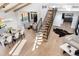 Open concept dining area with hardwood floors and access to backyard at 245 Fair Pl, Boulder, CO 80302