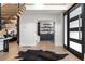 Elegant entryway with hardwood floors and view into home office at 245 Fair Pl, Boulder, CO 80302