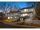 Stunning contemporary home with a white exterior, modern design, and landscaping at 245 Fair Pl, Boulder, CO 80302