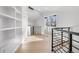 Home library with built-in shelves and hardwood floors at 245 Fair Pl, Boulder, CO 80302