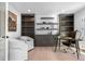 Spacious home office with built-in shelving and hardwood floors at 245 Fair Pl, Boulder, CO 80302