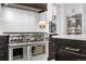 Gourmet kitchen with high-end stainless steel appliances and custom cabinetry at 245 Fair Pl, Boulder, CO 80302