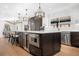 Modern kitchen with large island, stainless steel appliances, and wine cooler at 245 Fair Pl, Boulder, CO 80302
