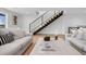 Light-filled living area showcasing a marble coffee table and comfortable sofas at 245 Fair Pl, Boulder, CO 80302