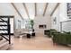 Light and airy living room with modern fireplace and seating area at 245 Fair Pl, Boulder, CO 80302
