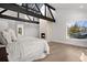 Primary bedroom with a fireplace, high ceilings, and large windows offering scenic views at 245 Fair Pl, Boulder, CO 80302