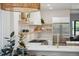Modern kitchen features open shelving, stainless steel appliances, and an open layout at 2844 Quitman St, Denver, CO 80212
